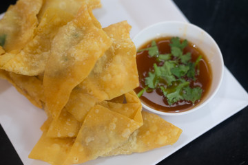The fried dumplings on plate and sauce
