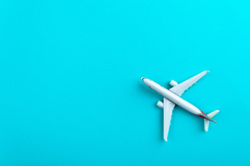 Airplane on blue pastel color background.