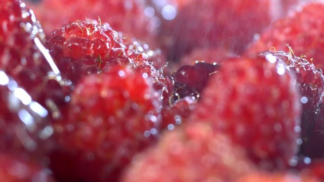 Fresh raspberry fruits as food background. Healthy food organic nutrition. View from above.