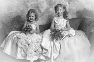 two young princesses in white
