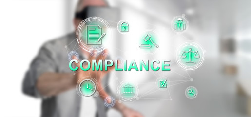 Man touching a compliance concept