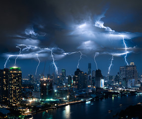 Lightning storm over city in blue light - obrazy, fototapety, plakaty
