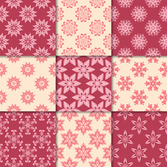 Cherry red and beige floral ornaments. Collection of seamless patterns