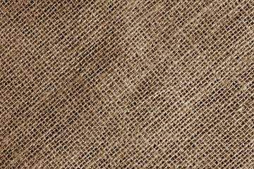 Fototapeta na wymiar Cotton fabric texture in brown color.