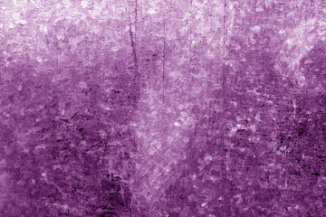 Old metal surface with scratches in purple tone.