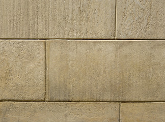 Stone wall texture with limestone slab of wild