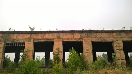 Fototapeta na wymiar Abandoned factory of the USSR