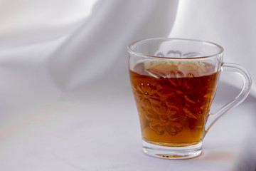 A glass of tea isolated on white 