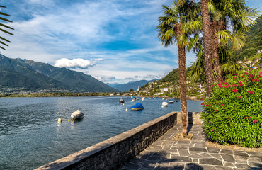 Landscape of Lake Maggiore with mountains and Magadino village in the background from Vira Gambarogno village, Ticino, Switzerland