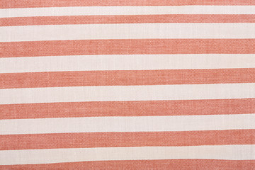 Gray and brown stripes. Striped brown and grey textile pattern as a background. Close up on vertical stripes material texture fabric. Linen cloth