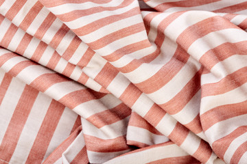 Gray and brown stripes. Striped brown and grey textile pattern as a background. Close up on vertical stripes material texture fabric. Linen cloth