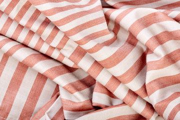 Fototapeta premium Gray and brown stripes. Striped brown and grey textile pattern as a background. Close up on vertical stripes material texture fabric. Linen cloth