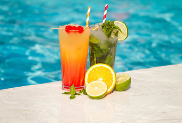 Tropical cocktail on a pool background