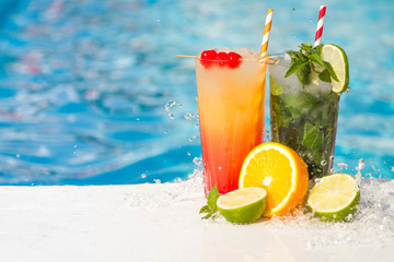 Tropical cocktail on a pool background