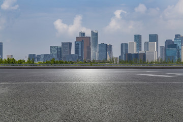Panoramic skyline and modern business office buildings with empty road,empty concrete square floor