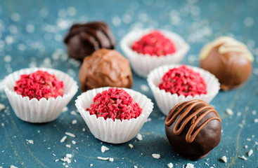 appetizing truffles on a wooden background