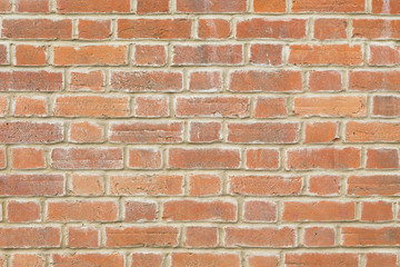 Red brick wall texture closeup
