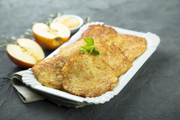 Potato pancakes, or latkes with apple sauce