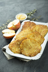 Potato pancakes, or latkes with apple sauce