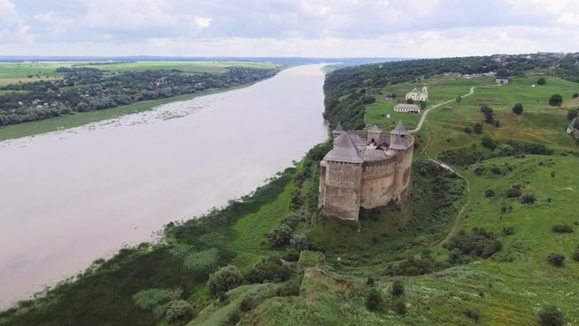 Aerial Shot. Old castle near the RIver. Hotin Castle in Ukraine. Eastern Europe