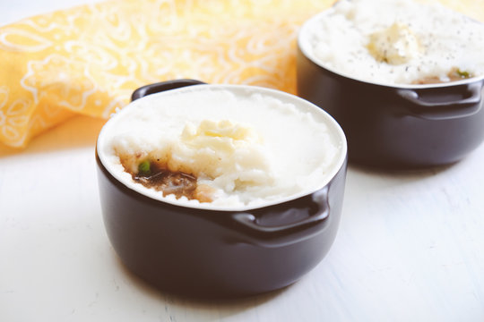 Baking bowls with delicious shepherd's pie