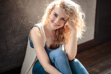 Fototapeta na wymiar Close-up portrait of sweet blonde woman in a casual jeans clothes, fashion beauty photo