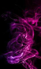 Colored smoke on black background