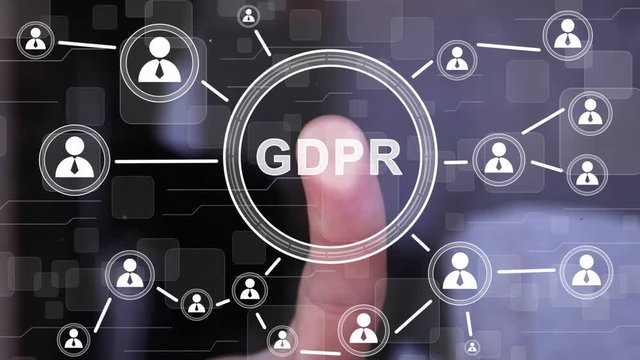 Businessman presses button GDPR general data protection regulation on virtual web electronic user interface.