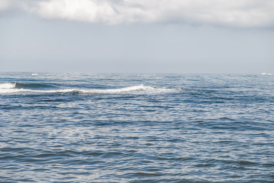 View of the sea, waves and calm wind.