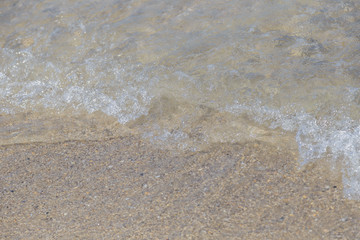 Lake Water Surface with Small Waves on Warm Sunny Bright Summer Day with No People. Lake Shore Water Background near Coastal Line with Sun Reflections, Nature Scenic Seascape