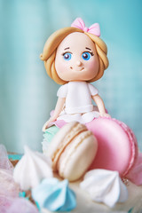 Obraz na płótnie Canvas decoration for cake doll girl with bow