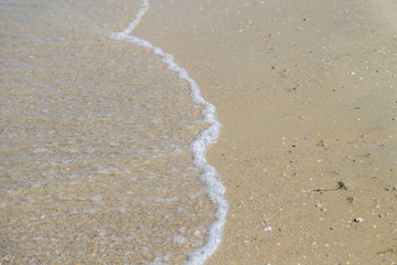 Lake Water Surface with Small Waves on Warm Sunny Bright Summer Day with No People. Lake Shore Water Background near Coastal Line with Sun Reflections, Nature Scenic Seascape