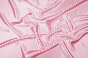 Pink luxury satin fabric texture for background