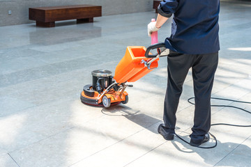cleaning floor with machine
