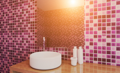 Modern bathroom including bath and sink. 3D rendering.. Sunset.