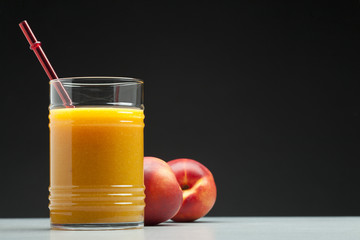 peach juice in glass
