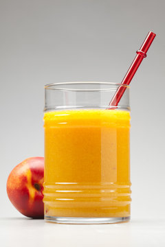 peach juice in glass