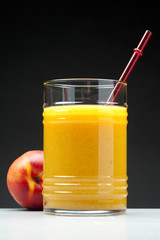 peach juice in glass