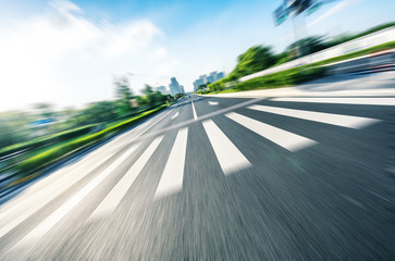 city skyline with asphalt road in urban