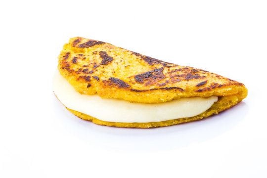 Cachapa with cheese, Typical Venezuelan cuisine made of ground corn and white cheese, white background