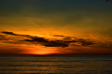 Amazing beach sunset with endless horizon