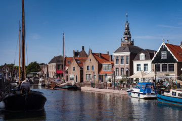 Fototapeta premium Monnickendam, Netherlands, July 2018: Monnickendam in the Netherlands decorated for the summer weekly 