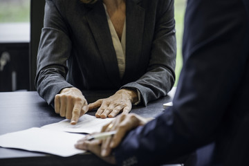 Business people discussing paperwork