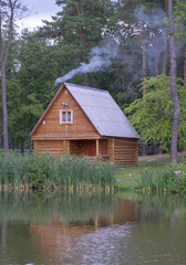 house by the forest by the lake