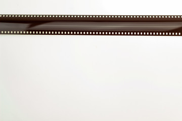 33mm old film empty for vintage retro camera Exposure that photographers used before the digital era on the background. isolated white