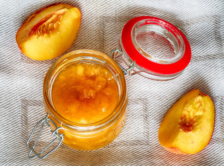 Jar of homemade peach jam
