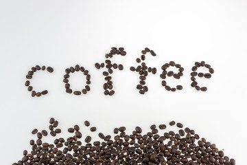Aromatic coffee beans for espresso coffee to keep the body energized on a white isolate background,