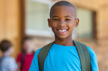 Smiling african school boy - Powered by Adobe