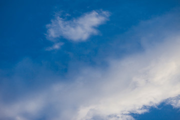 Naklejka na ściany i meble Blue sky background with tiny clouds. panorama