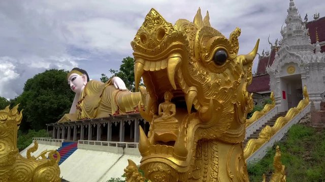 Aerial View of Buddhist Temple Wat Phra That Suthon Mongkon Khiri features beautiful architectures that are inspired by the ancient, traditional ordination hall (Ubosot) and reclining Buddha statue